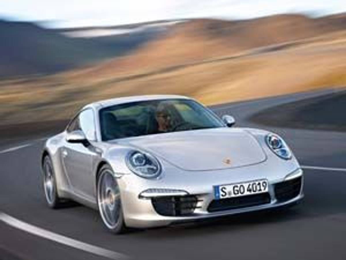 All-new Porsche 911 Carrera soars - ZigWheels