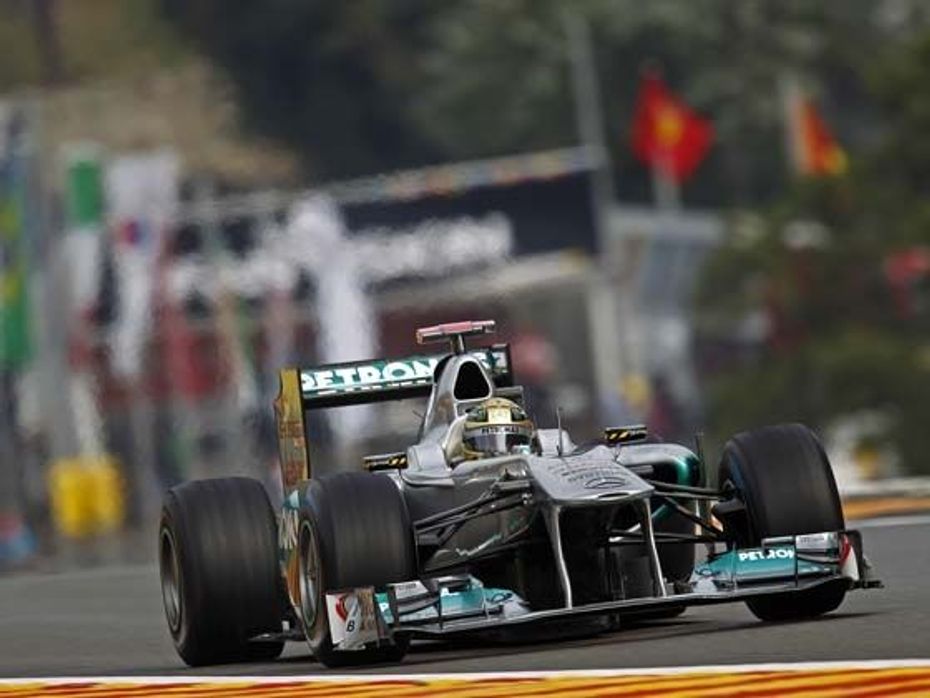 Michael Schumacher tops timesheets at wet Spa details