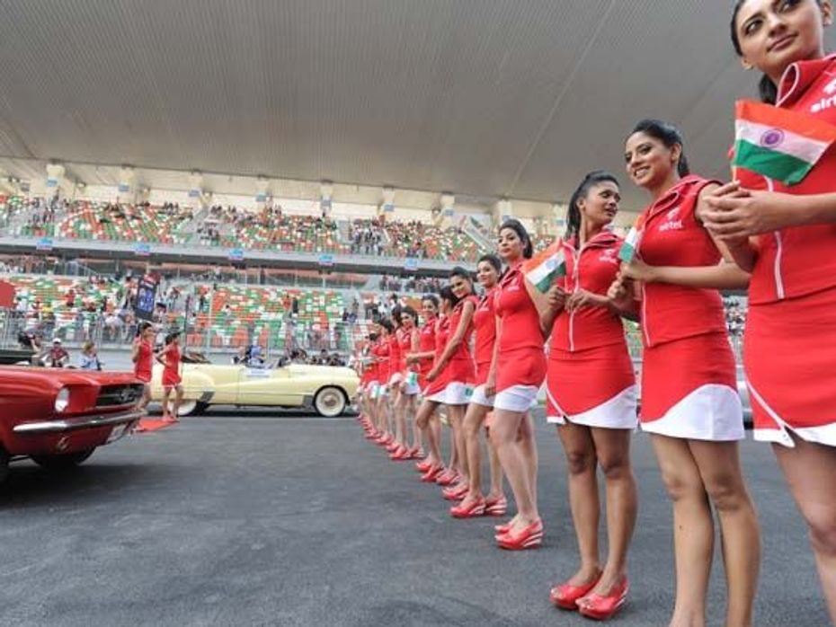 Pit Girls welcome visitors to the Buddh International Circuit for the first ever Indian GP