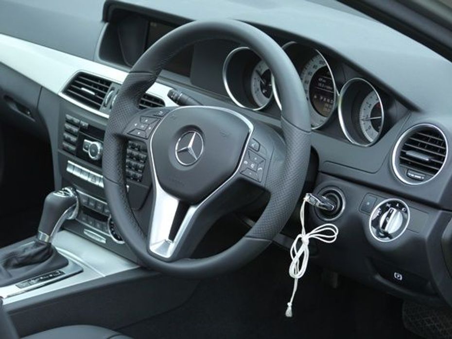 The steering wheel gets 12 buttons mounted on it too, which is standard across variants