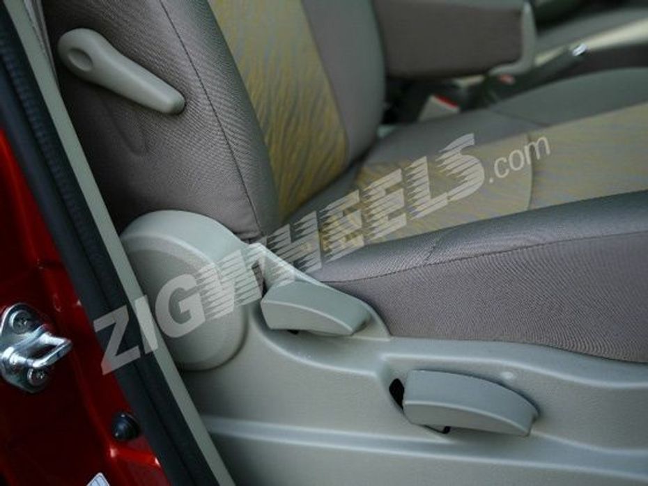 Mahindra Quanto manual controls for lumbar support, seat back angle and seat height adjustment