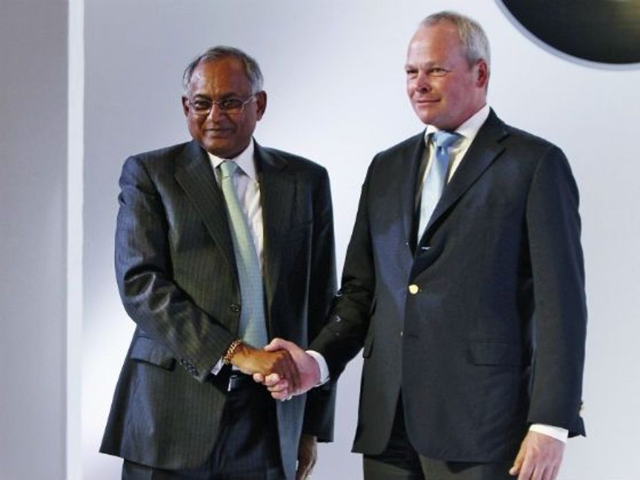 Venu Srinivasan and Stephan Schaller of TVS and BMW during the announcement of joint venture between the two wheeler manufacturers
