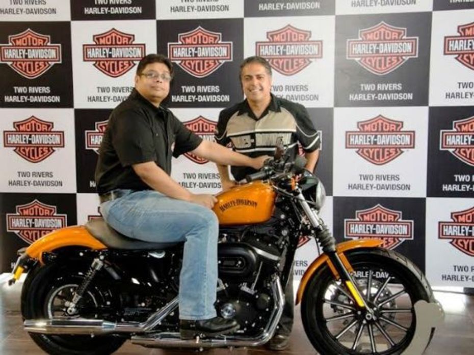 Anoop Prakash and Sunil Christian pose at the Pune Harley-Davidson dealership