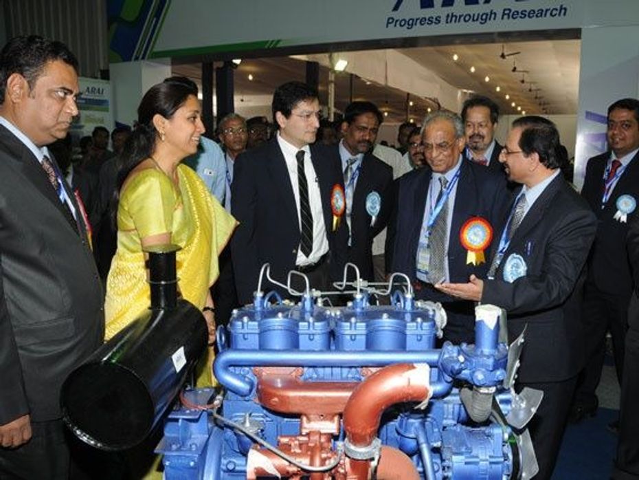 Dignitaries having a look at the diesel engine developed by ARAI