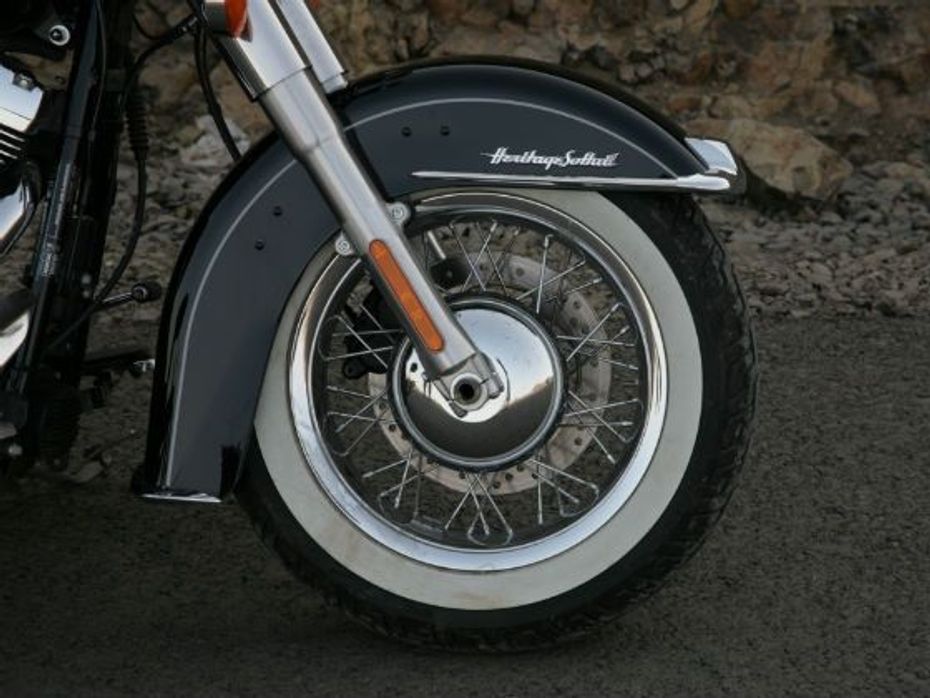 White side-walled tyres on chrome finished spoke rim