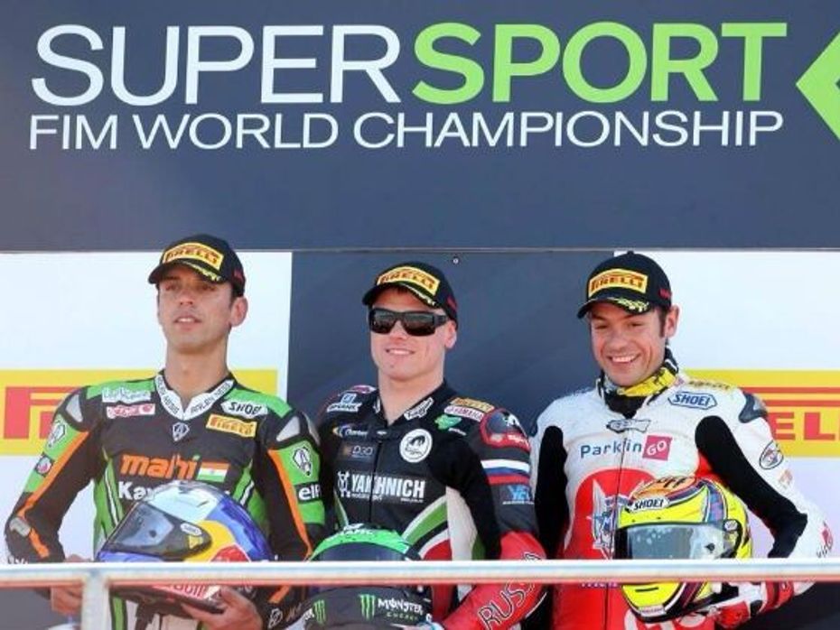 Kenan Sofuoglu pose with other winners on the podium