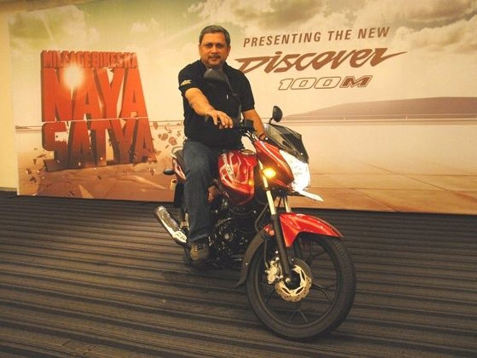 K.Srinivas poses with the Discover 100M at the launch