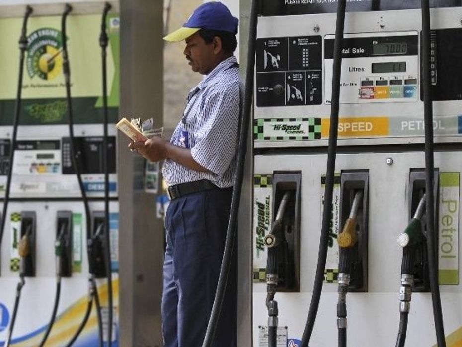 Indian petrol pump after fuel prices are slashed