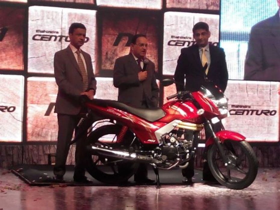 Mahindra officials pose with the Centuro N1