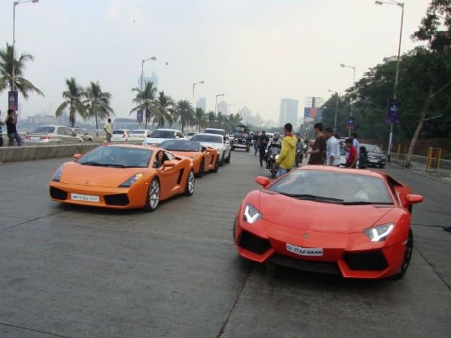 cars lined up at super car show