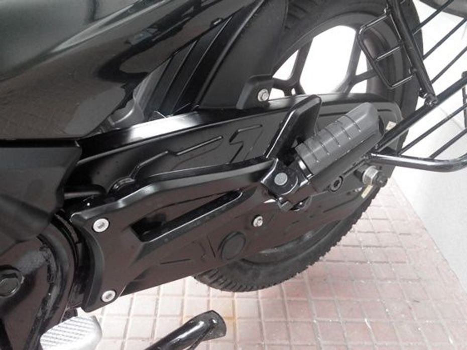 Bajaj Discover 150S chain guard and side step detail