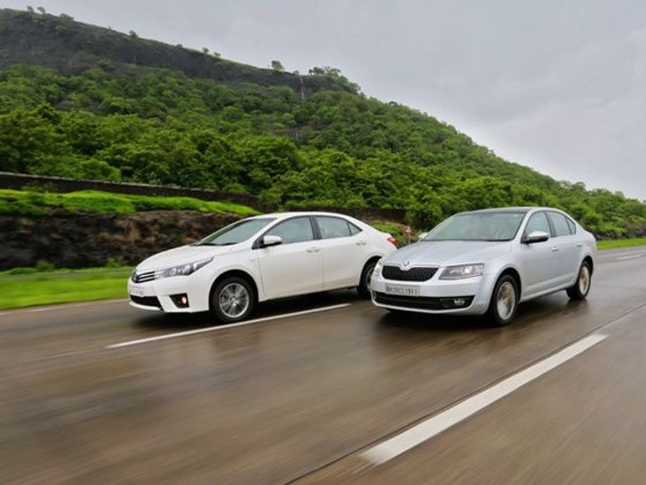 Toyota Corolla Altis and Skoda Octavia petrol in action