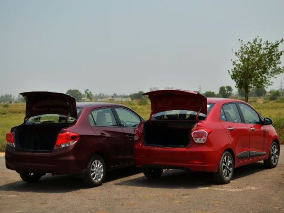 Hyundai Xcent and Honda Amaze rear with open bootlid