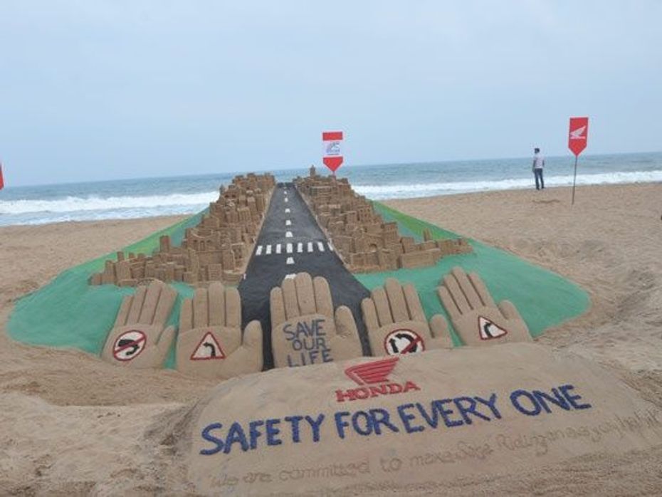 Honda educates road safety through sand art