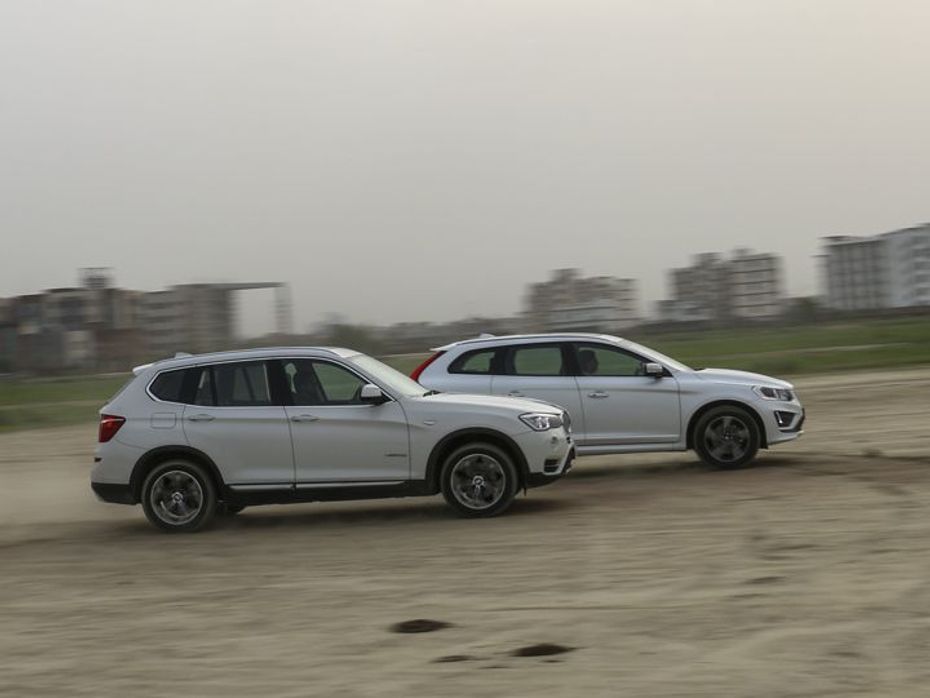 Volvo XC60 and BMW X3 in the dust
