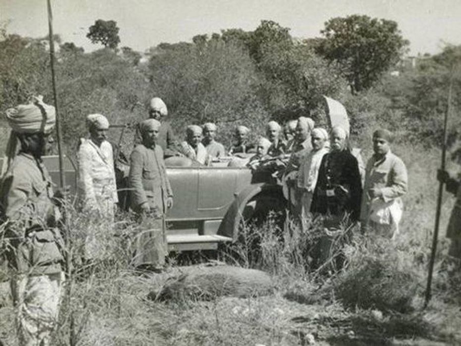 Maharana Bhupal Singh at wild boar shikar in his Rolls-Royce