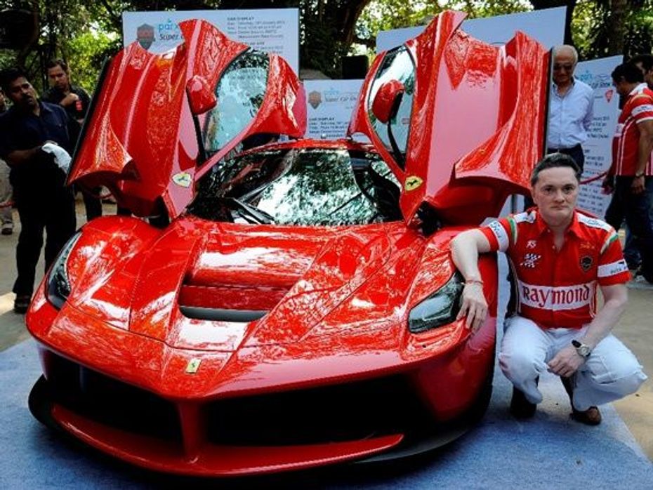 Gautam Singhania poses with the Ferrari LaFerrari