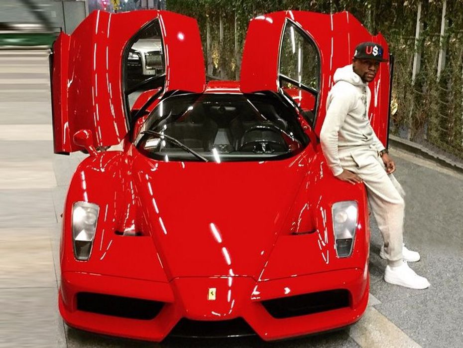 Floyd Mayweather with his Ferrari Enzo