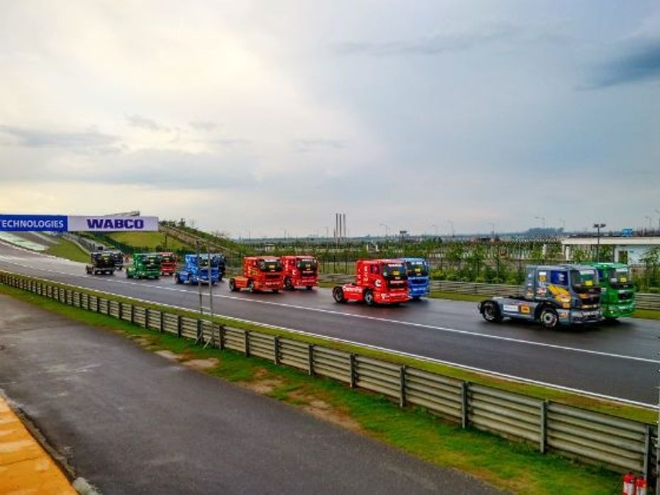 Trucks racing on a wet Buddh International Circuit