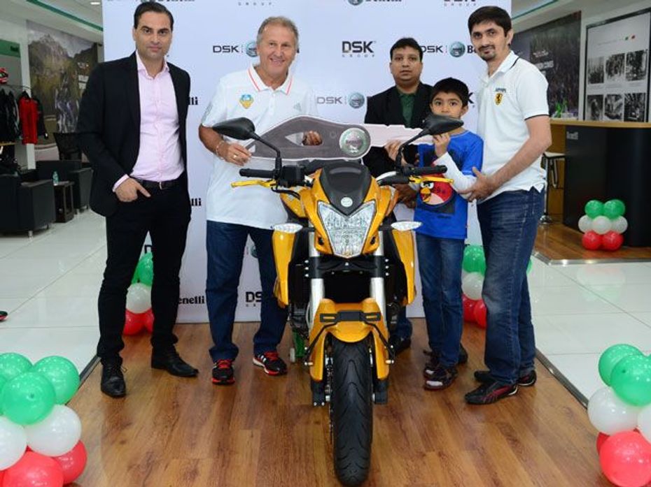 Ardeshir Jeejeebhoy-CEO-DSK Shivajians with Zico the Coach of FC Goa and the lucky DSK Benelli superbike customer