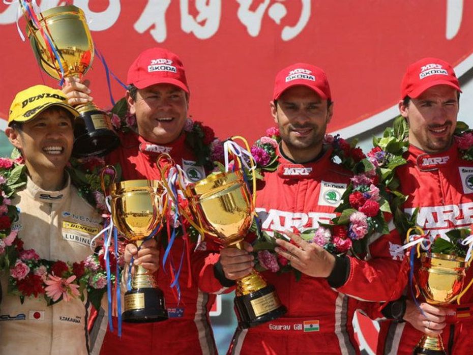 Gaurav Gill with his co-driver after winning a APRC Rally Round in China