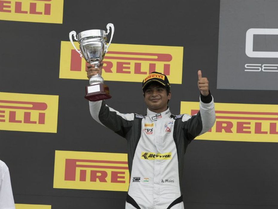 Arjun Maini with his podium finish trophy