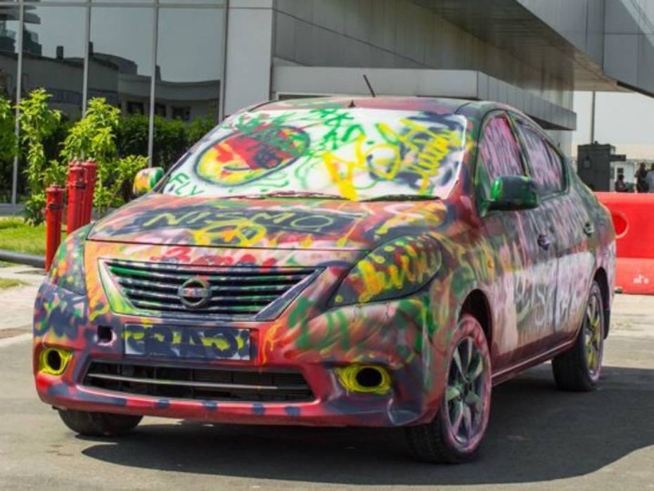 Nissan Sunny covered in colours