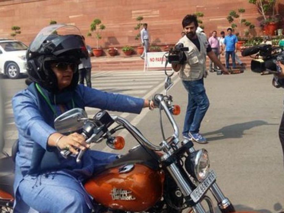 Ranjan, who won the 16th Lok Sabha election from the constituency of Madhepura, Bihar cut a dashing figure in a blue salwar kameez and dark sunglasses with a white helmet strapped on securely and drew much attention as she roared into Parliament.