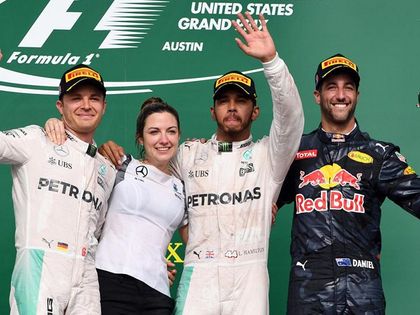 Lewis Hamilton with other podium finishers
