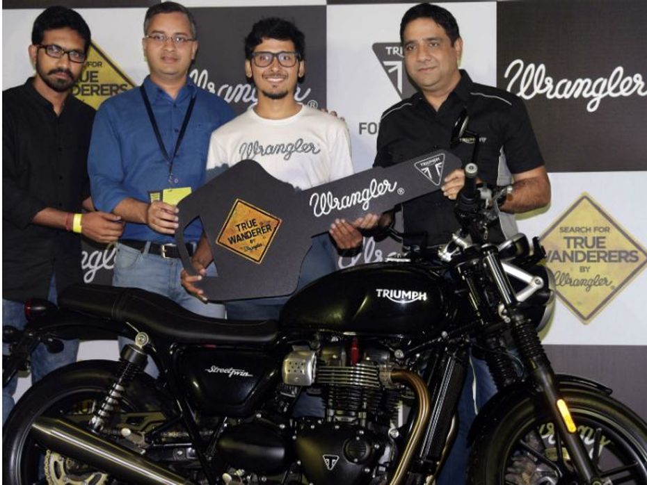Gaurav Siddharth receiving his new Triumph motorcycle