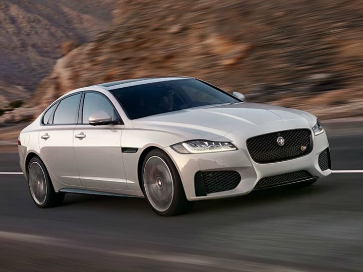 Jaguar has added two new variants of the 2.0-litre, 4-cylinder, turbocharged Ingenium engines to the XE and XF sedan lineup in India. This comes more than a year after the XE, XF and F-Pace were fitted with the same engine developing a whopping 300PS of power in the UK. The two variants of the engine on offer in India will be available in two states of tune.  The Pure and Prestige variants of the XE and the Prestige variant of the XF will be powered by the 2.0-litre Ingenium engine in its 200PS @ 4500-6000rpm and 320Nm @ 1500-6000rpm tune. Meanwhile, the top-of-the-line Portfolio variant of both the sedans will be powered by the 2.0-litre Ingenium engine in its 250PS @ 5500rpm and 365Nm @ 1500rpm tune. The engines will be paired to the familiar 8-speed, ZF-sourced automatic transmission.  The petrol engine should suit the dynamic design of both the cars and give them that sporty feeling that the diesel variants couldn’t achieve. The claimed performance figures are certainly better (in the XE Pure trim, the petrol is 0.7 seconds faster than the diesel in a 0-100kmph run). Of course, being an Ingenium engine, the focus is also on lower emissions and higher fuel efficiency. Jaguar has not revealed the figures but the new Ingenium motors, with their lighter all-aluminium build, better thermal  efficiency, low-lag twin-scroll turbocharger and optimised combustion, should fare better than its immediate rivals.  Adding the new petrol engine has made the XE more affordable than before, with the XE Pure being priced at Rs 35.99 lakh (ex-showroom) as compared to Rs 45.76 lakh for the XE Pure diesel. The XF Prestige variant, on the other hand, is priced at Rs 49.80 lakh (ex-showroom).