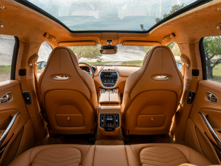 Here's A Peek Inside The Aston Martin DBX SUV Before Its November 20 Reveal