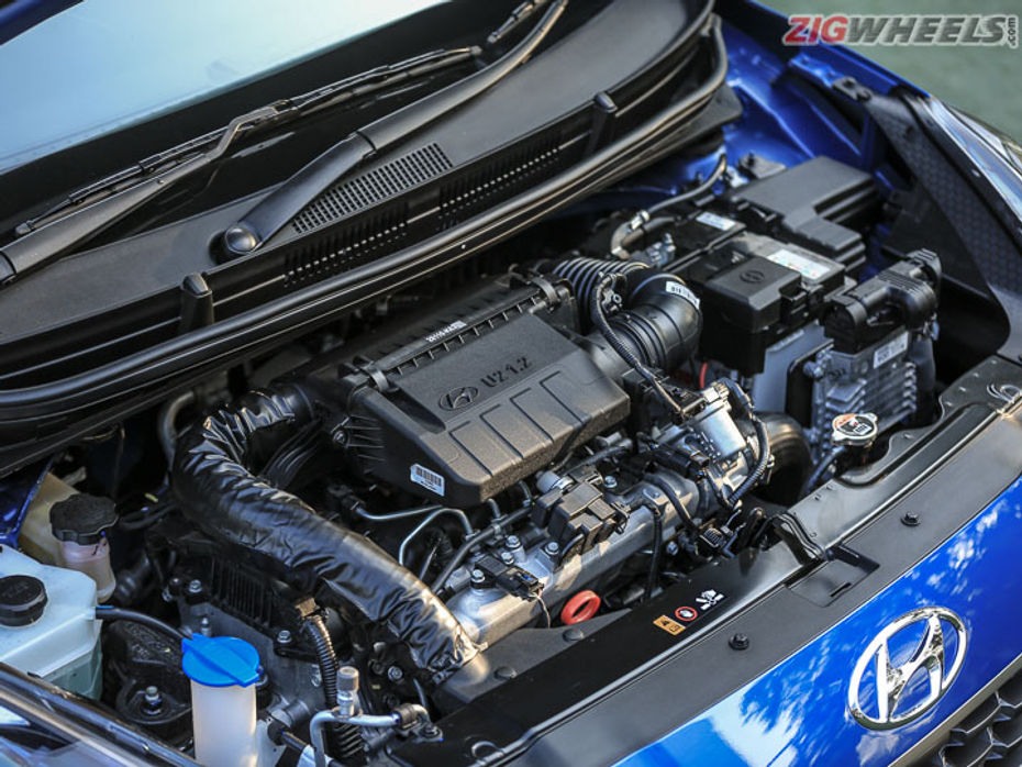 Hyundai 1.2-litre U2 diesel engine sitting in the engine bay of the Aura  