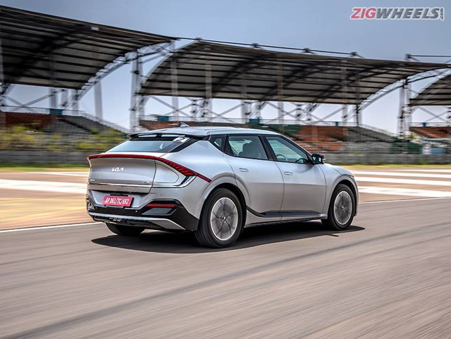 Rear end of Kia EV6 in action shot on racetrack