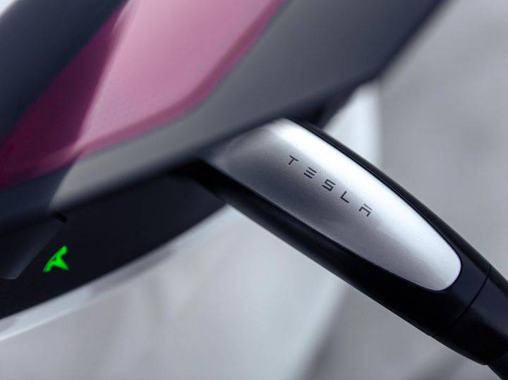 Tesla Makes Its EV Charging Port Open To Other EV Makers - ZigWheels