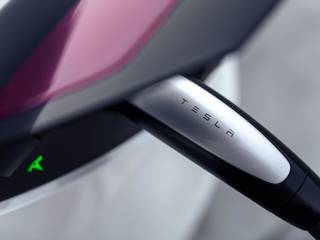 Tesla’s EV Charging Port Becomes Open For Other EV And Charger Makers