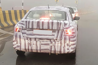 Next-gen 2024 Maruti Suzuki Dzire Spied For The First Time, Offering Glimpse Of Rear Styling
