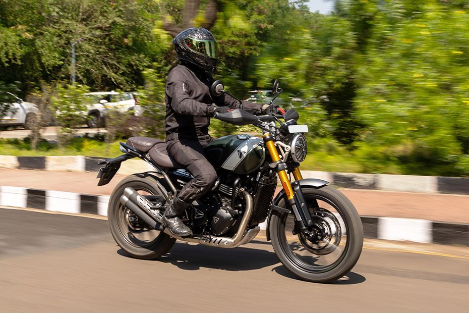 Riding: Front Right Quarter View of Scrambler 400 X