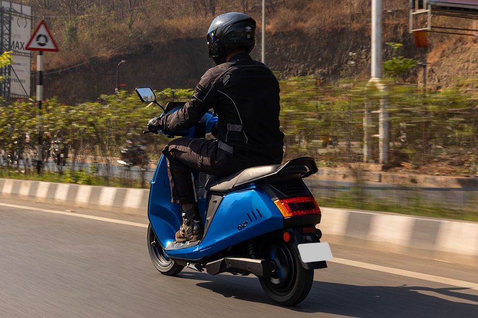 Riding: Rear Left Three Quarter View of DX EV