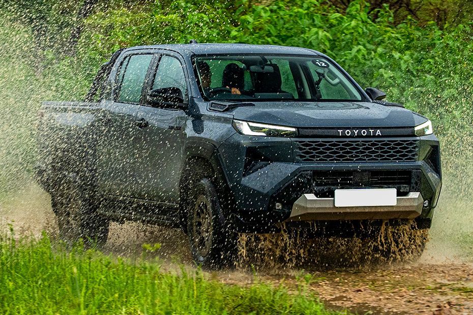 Driving: Front Right Quarter View Image of Hilux