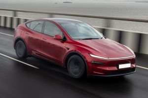Driving: Front Right Quarter View Image of Model Y