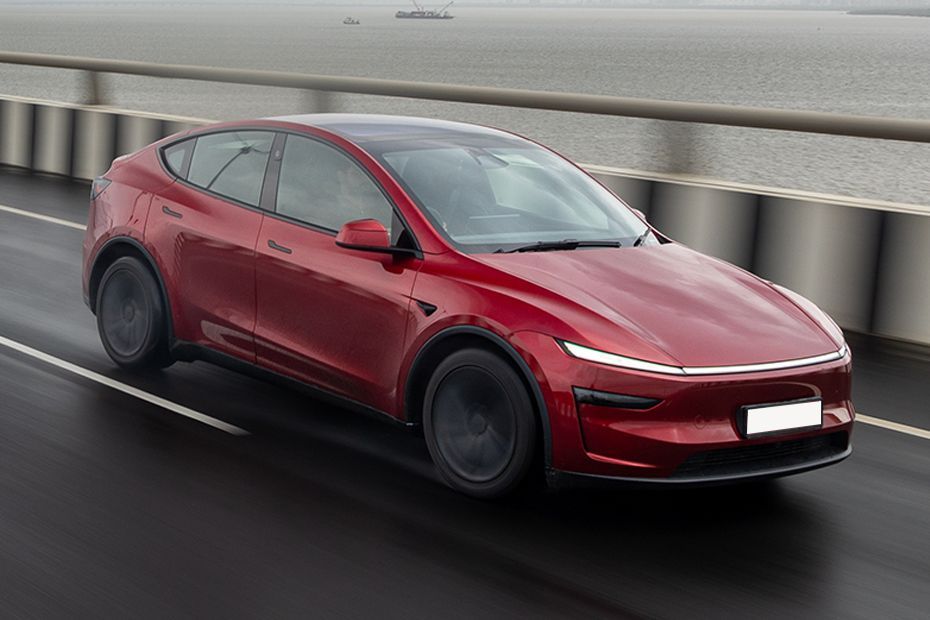 Driving: Front Right Quarter View Image of Model Y