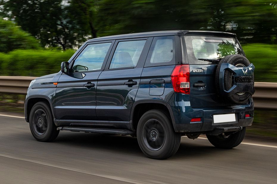 Driving: Rear Left Three Quarter View Image of Bolero Neo