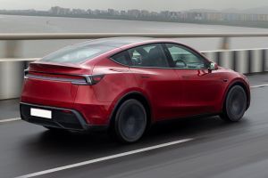 Driving: Rear Right Three Quarter View Image of Model Y