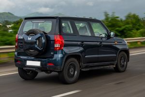 Driving: Rear Right Three Quarter View Image of Bolero Neo