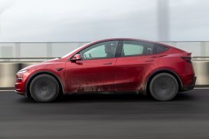 Driving: Side Profile (Left) View Image of Model Y