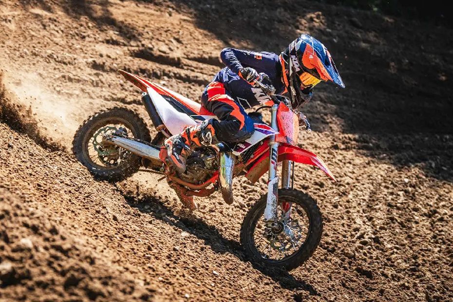 Riding: Front Right Quarter View of 65 SX