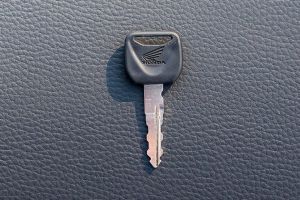 Front side of Key of Shine 100 DX