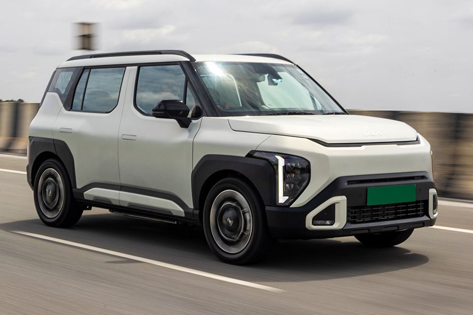 Driving: Front Right Quarter View Image of Syros EV