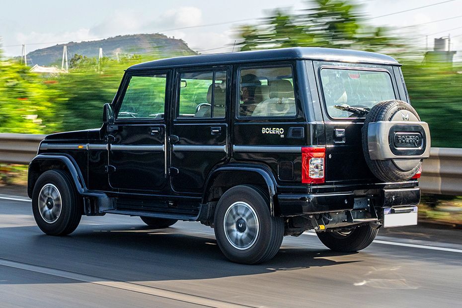 Driving: Rear Left Three Quarter View Image of Bolero